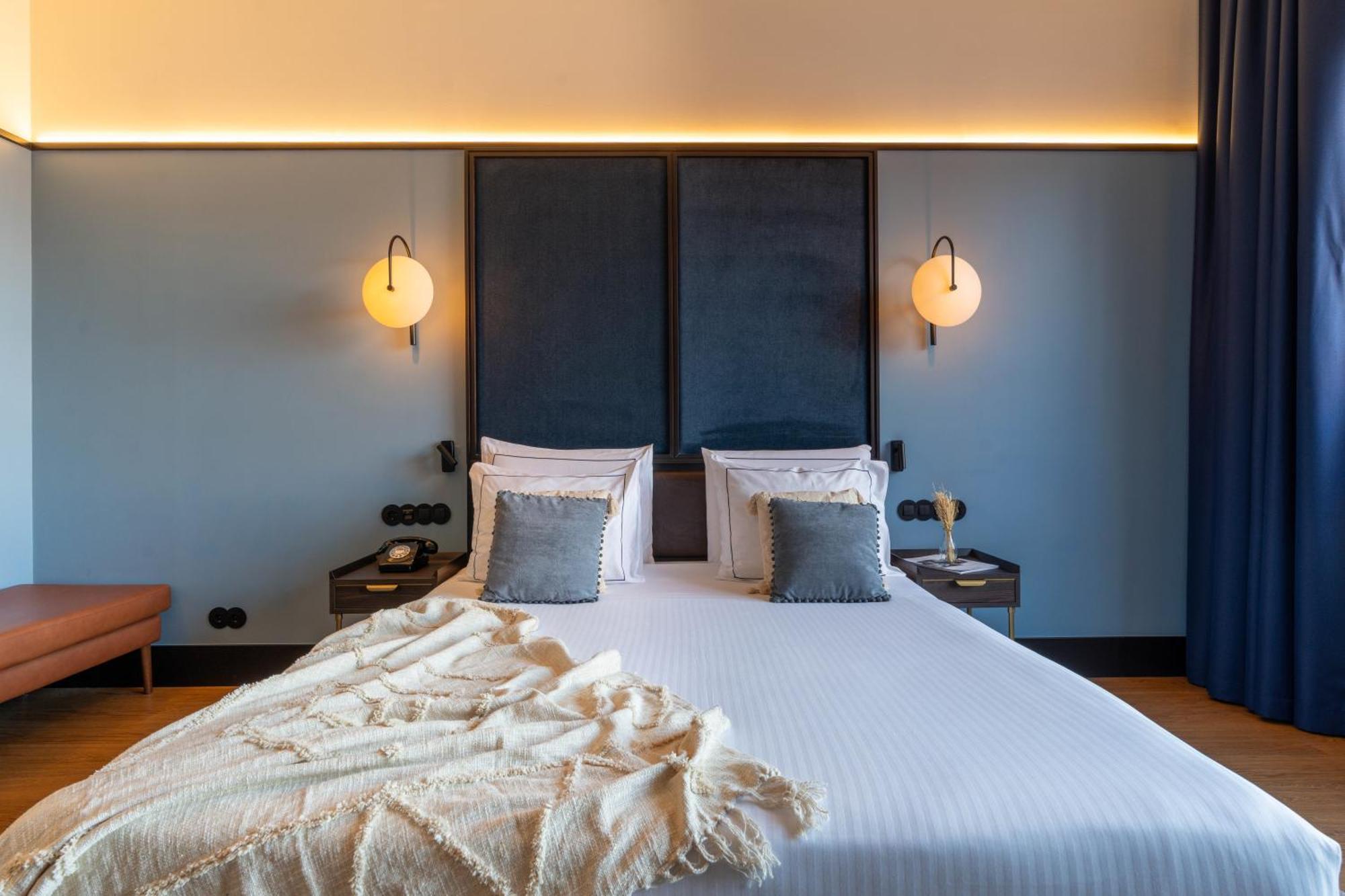The Editory Riverside Hotel, An Historic Hotel Lisboa Eksteriør billede A bedroom at the hotel